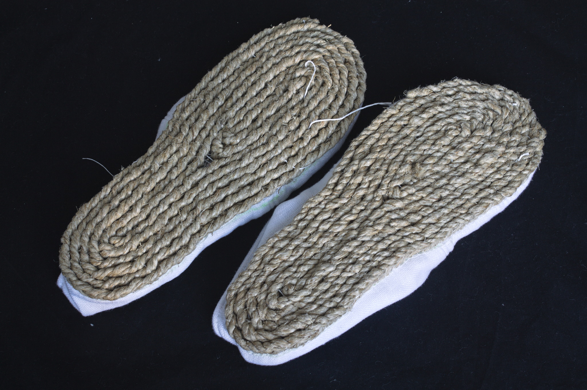 the slippers with the braided soles on top.