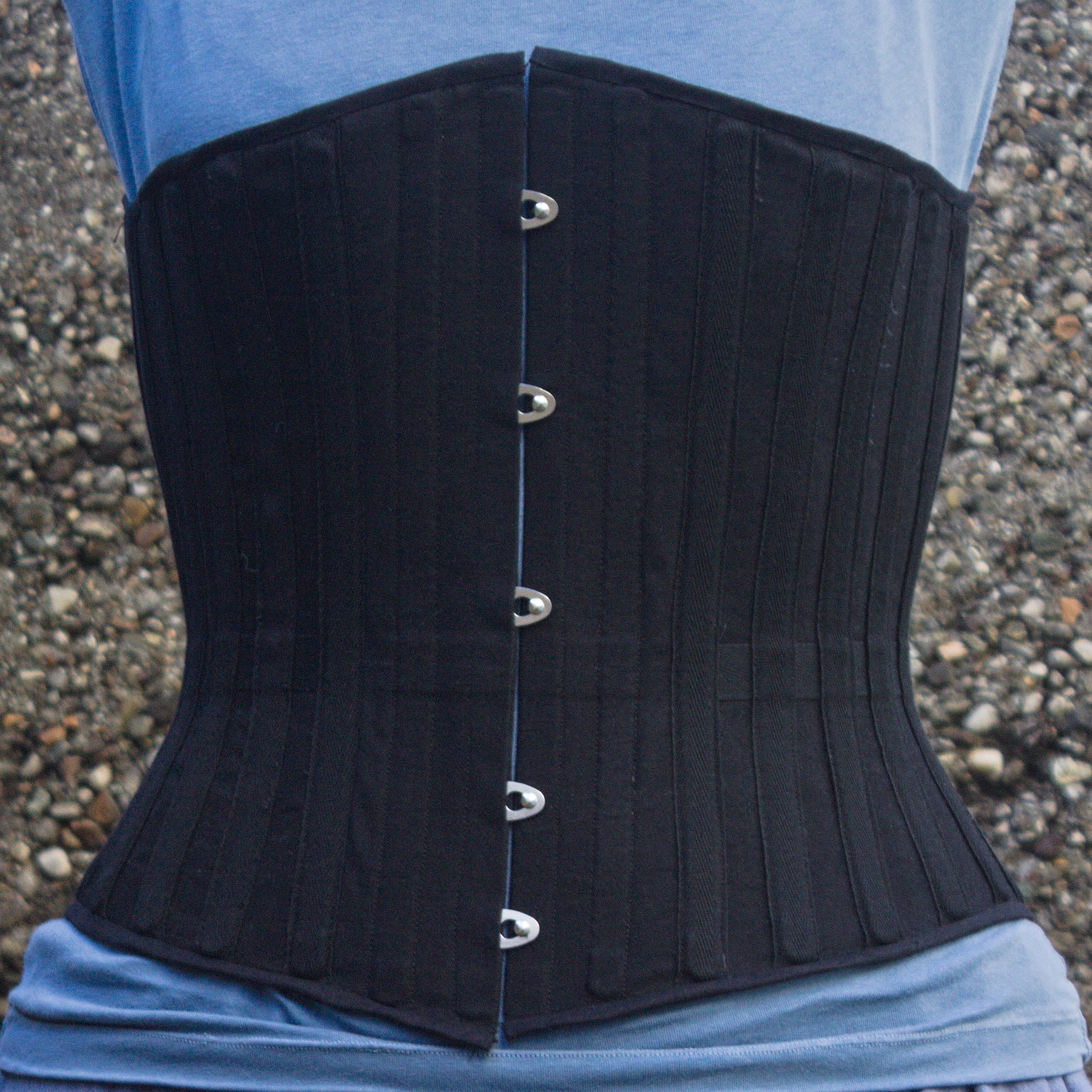 The same corset straight from the front: the left side is a few mm longer than the right side