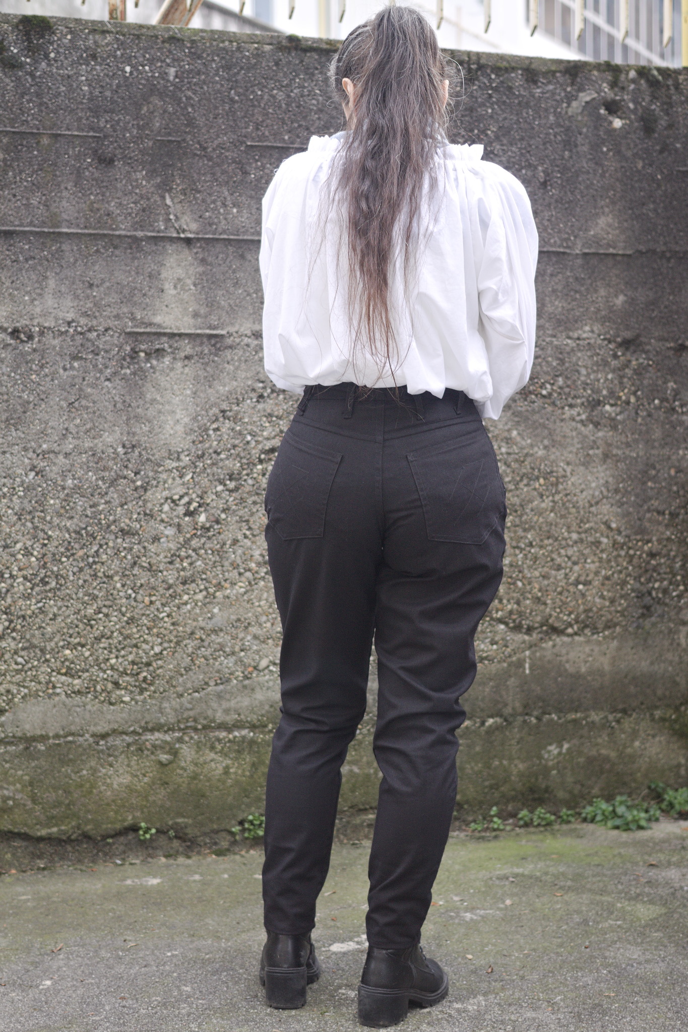 Same as above, from the back, with the crotch seam pulling a bit. A faint decoration can be seen on the pockets, with the line art version of the logo seen on this blog.