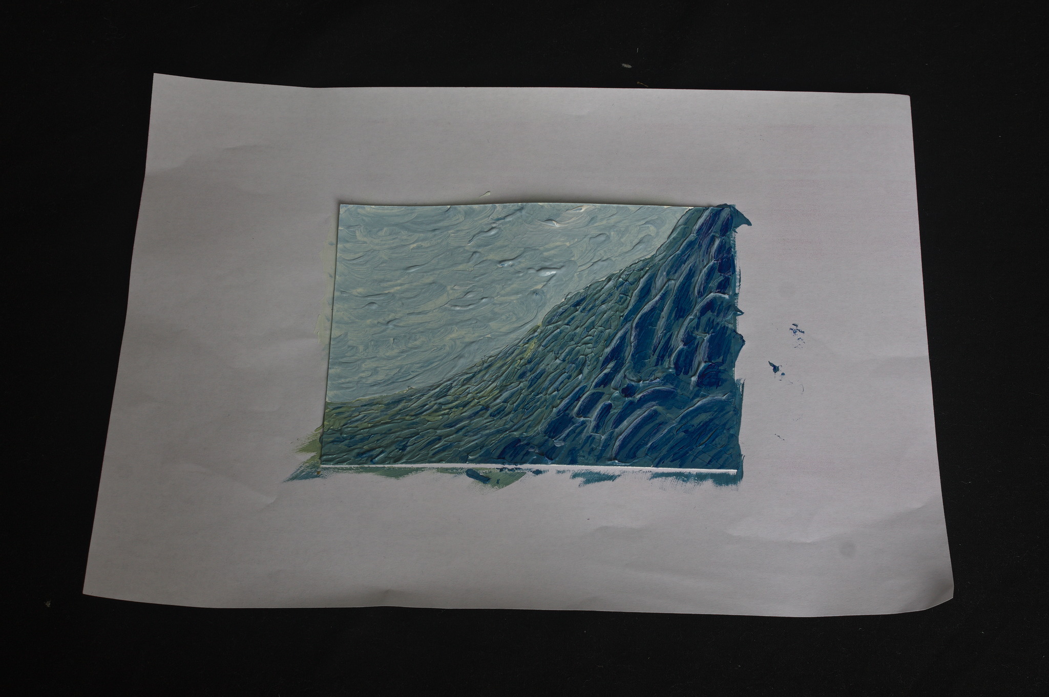 The study above over a sheet of scrap paper: at one of the edge
the excess paint has connected the two together.