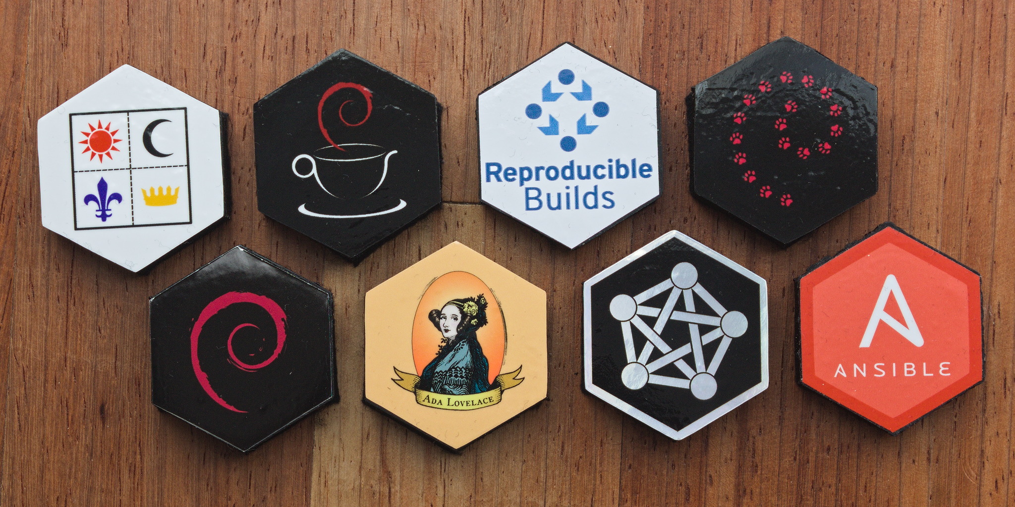 Eight hexagonal pieces with free software / culture related
graphics on top.